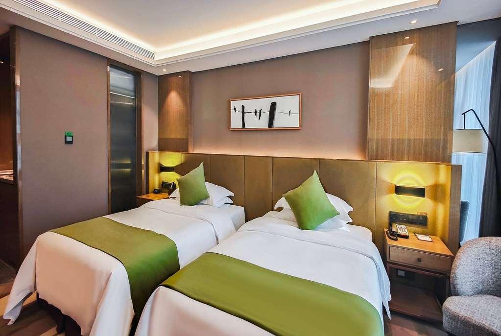 Leshan Ramada Hotel Стая снимка