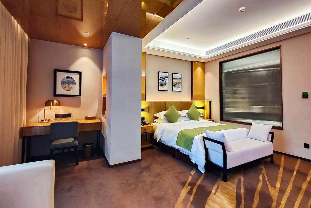 Leshan Ramada Hotel Стая снимка