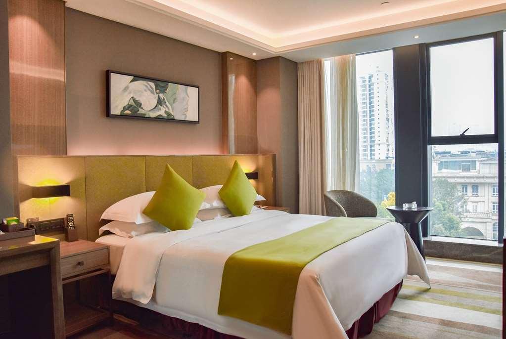 Leshan Ramada Hotel Стая снимка
