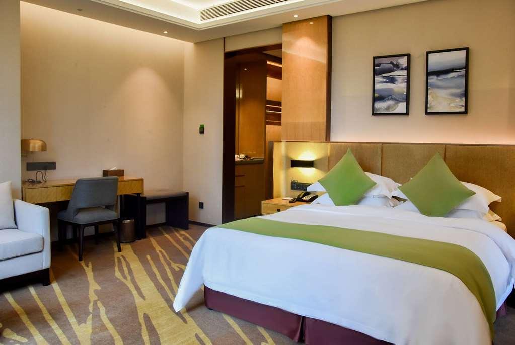 Leshan Ramada Hotel Стая снимка